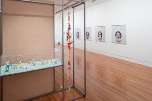 Erica Van Zon, 12 Chinese Ride Characters, 2011. Clay, acrylic, enamel, silver foil. Chinese Charm Chain, 2011. Mixed media. Steve Carr, Milk and Honey 1-4, 2010. Digital photographic prints. Photo by Sam Hartnett.