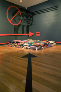 Pat Hoffie, Pacific Solution, 2007 (installation view). Acrylic on walls, 131 knitted and crocheted blankets. Courtesy of the artist