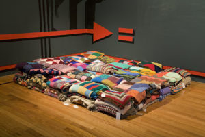 Pat Hoffie, Pacific Solution, 2007 (installation view). Acrylic on walls, 131 knitted and crocheted blankets. Courtesy of the artist