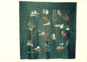 Malcolm Harrison, Night Fishing on the Lagoon of the Mermaid, 1988-9 (installation view). Parachute nylon appliquéd quilt. 1930mm x 1940mm.