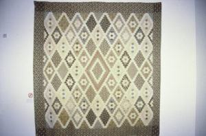 Bedspread (England), 1844 (installation view). Cotton patchwork. 2480mm x 2320mm.