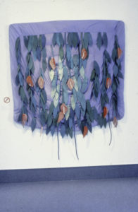 Anna Bibby, Naughty Boy Quilt, circa late 1970s (installation view). Kapok & cotton quilt with attached satin flowers and leaves. 1500mm x 1555mm.