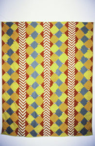 Tivaevae Cook Island, date unknown (installation view). Cotton piecework. 2030mm x 1680mm.