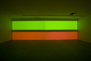 Clinton Watkins, Untitled (Force Field), 2010 (installation view). Stereo sound with sub woofer, dual channel DVD projection.  20 mins, looped. Courtesy of Two Rooms, Tāmaki Makaurau Auckland. Photo by Sam Hartnett.