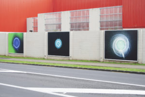 Darren Glass, from the series Cosmo Flying Disc 2001-2009, 2009 (installation view). Inkjet billboard prints. Courtesy of Anna Miles Gallery, Tāmaki Makaurau Auckland.