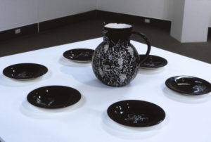 Bill McKay, Untitled, 1993 (installation view). Hand painted dinner set.