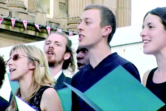 Tellervo Kalleinen & Oliver Kochta-Kalleinen, The 1st Complaints Choir of Birmingham, 2005 (still). With the Complaints Choir. DVD video. Courtesy of the artists.