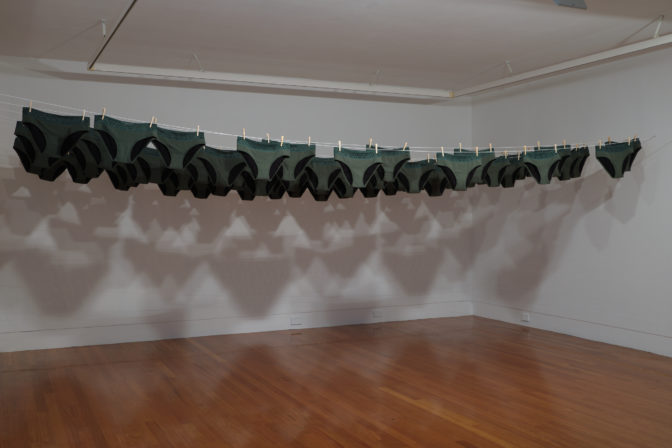 Chantel Matthews, Tides of Life, 2021 (installation view). 200 AWWA period underwear, washing line, pegs. Available to be taken during the course of the exhibition. Commissioned by Te Tuhi, Tāmaki Makaurau Auckland. Photo by Sam Hartnett.
