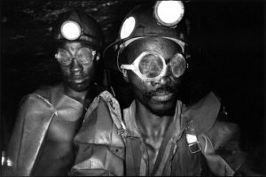 Bruce Connew, Drillers - Deelkraal goldmine, Transvaal, August 1985. Black and white photograph.