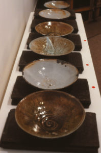 Ross Mitchell-Anyon, Spiral Bowls, 1989 (installation view). Salt glazed earthenware.