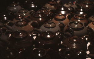 Ross Mitchell-Anyon, Teapots, 1989 (installation view). Salt glazed earthenware.