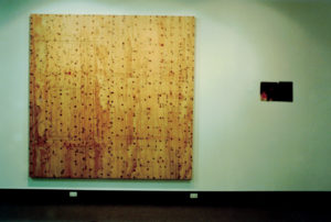 John Reynolds, Capricio Espagnol (left), 1993 (installation view), graphite on burnt plywood. The Gardens of Spain (right), 1993 (installation view). Ink on canvas.