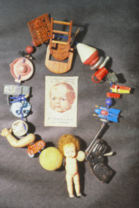 Joan Atkinson, Necklace. Plastic, wood, metal toys.