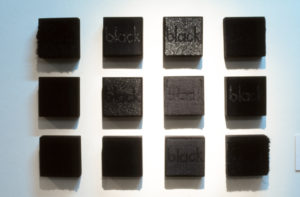 Marilyn Rea-Menzies, black on black, (installation view). Cotton and wool tapestry. 150mm x 150mm each.