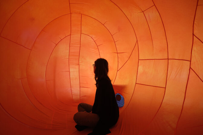 Bailee Lobb, Orange Cathedral, 2021 (detail). Hand-dyed nylon, mixed plastic, magnets, electrical fan, polyester. Approx. 2000 x 4000 x 1800mm. Installation comprising five elements with variable dimensions. Photo by Sam Harnett.