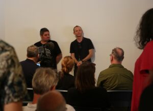 The chronicle of <cognition> contributors Eugene Hansen (left) and Bruce E. Phillips (right) at Paula Booker – The chronicle of <cognition>: Opening address (2023).